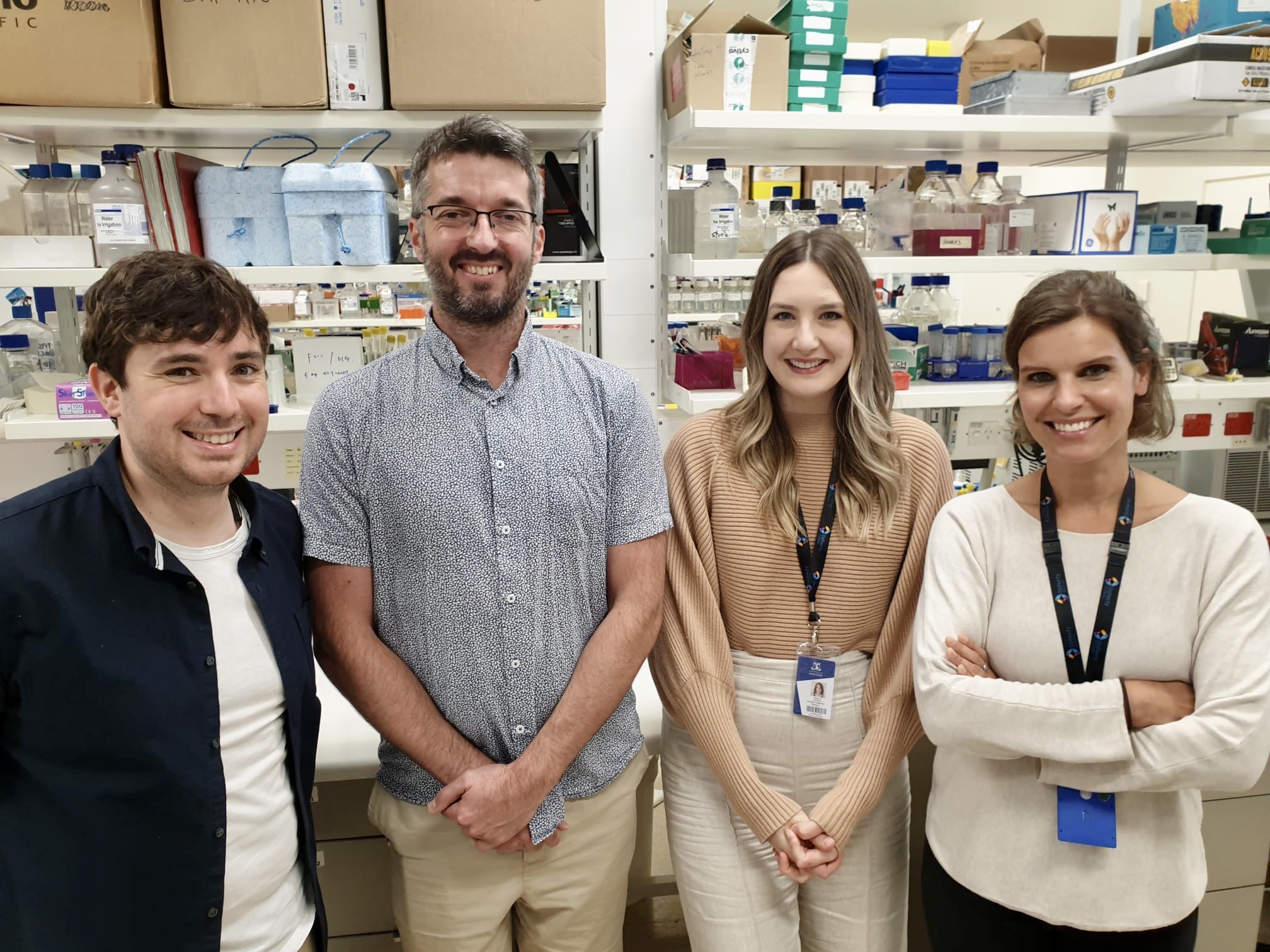 Tom Fulford, Adam Uldrich, Rachel Pascoe and Celine Gubser standing together in the lab. 