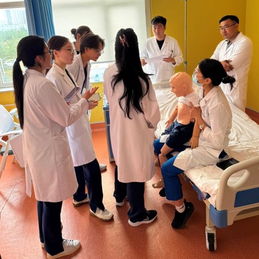 Newly trained Mongolian educators facilitating medical students during the final day of the course