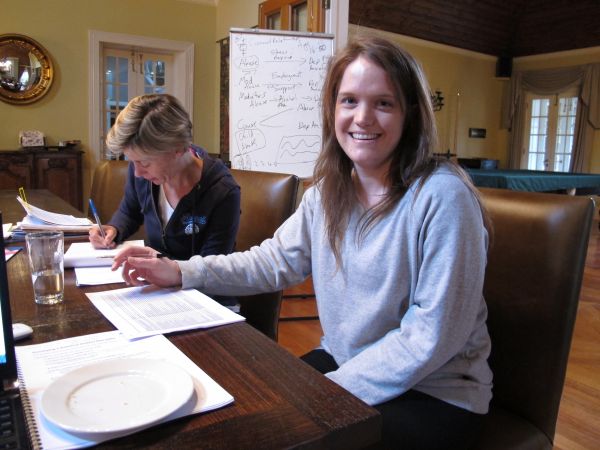 Photo of 2 researchers sitting at a table