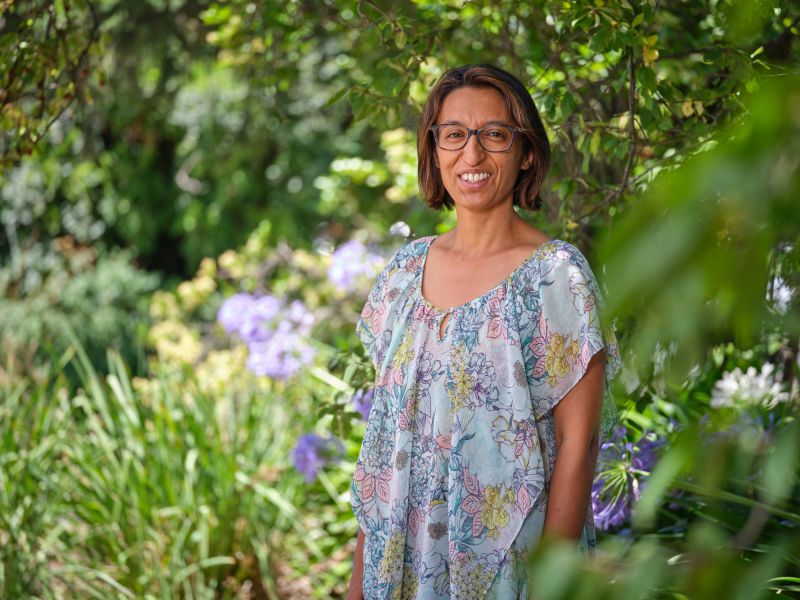 Dr Shaba Rajapaksa standing outside in a garden