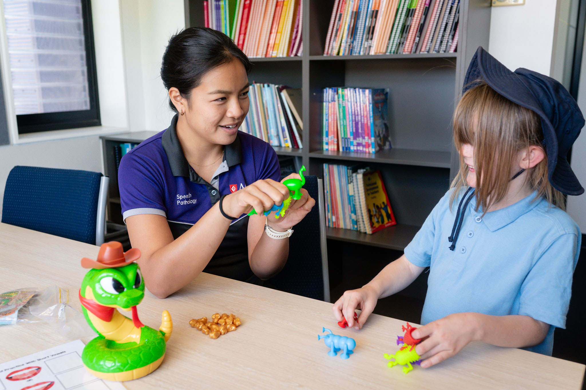 Occupational therapist with student.