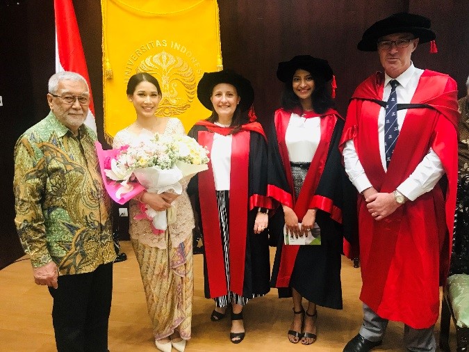 Ms Ayesha graduating pictured with her father, Professor Steve Trumble, Dr Anita Horvath and Dr Krithika Sundaram